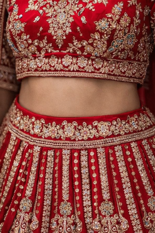 Red Bridal Lehenga Choli with Heavy Gold Embroidery