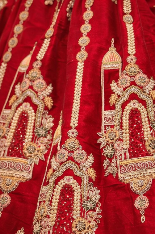Red Bridal Lehenga Choli with Heavy Gold Embroidery